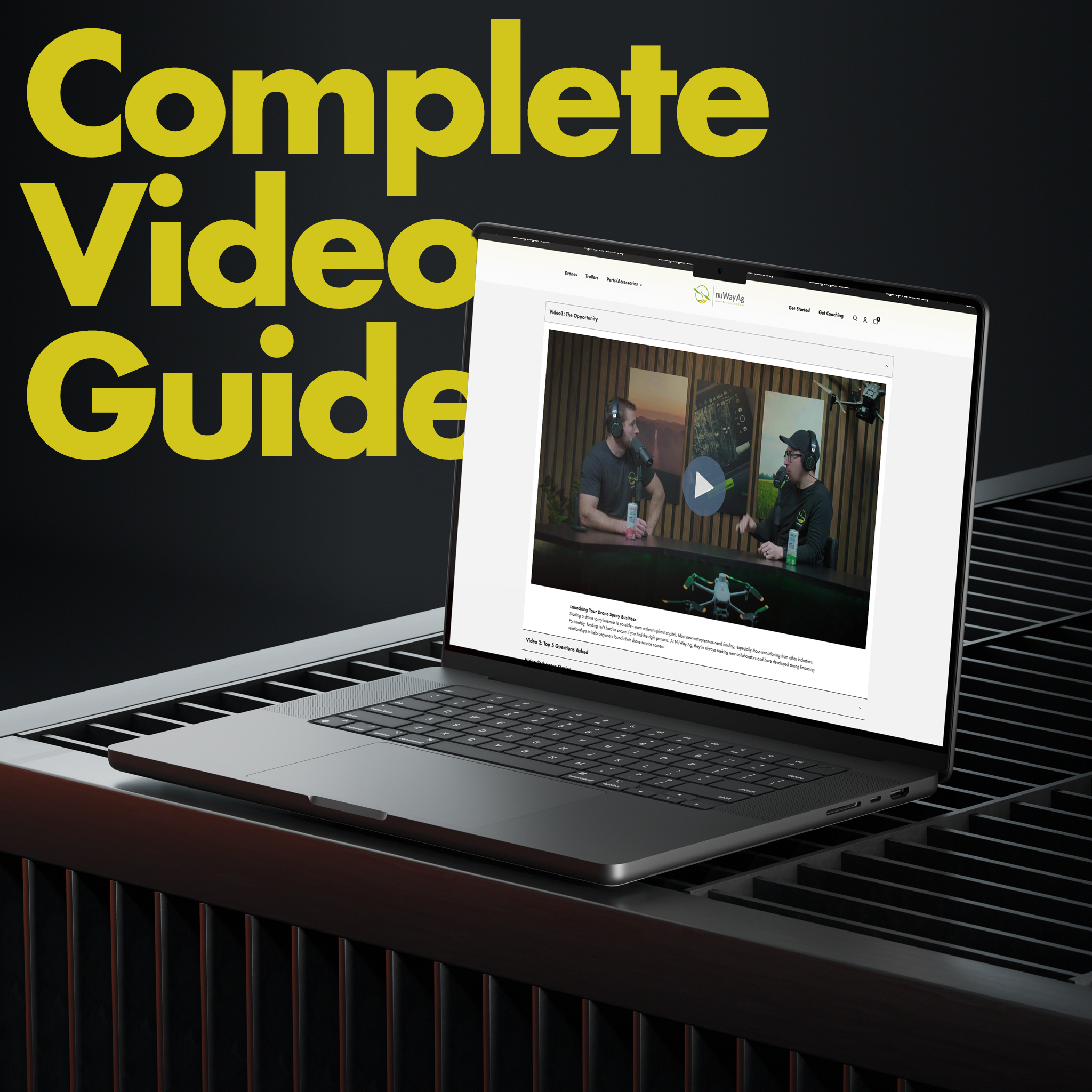 Laptop displaying a video on a dark surface with 'Complete Video Guide' text.
